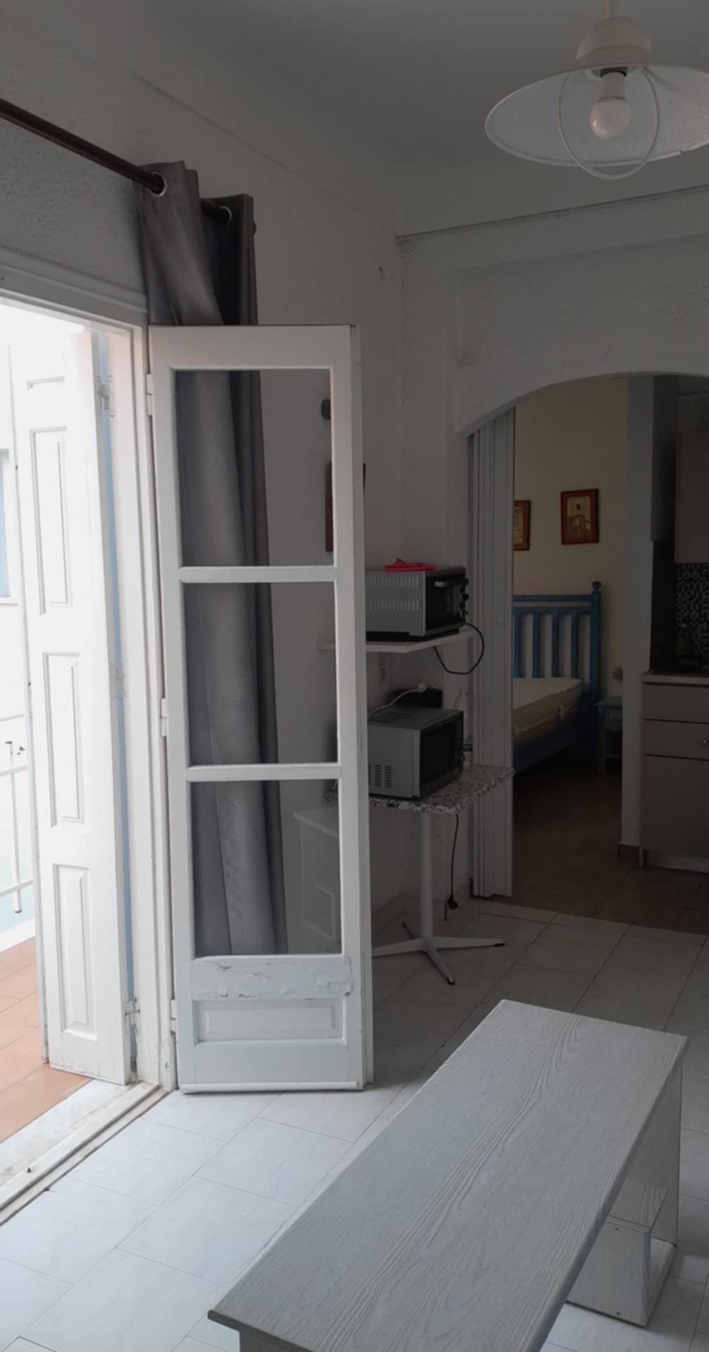 Kitchenette with mosaic tiles