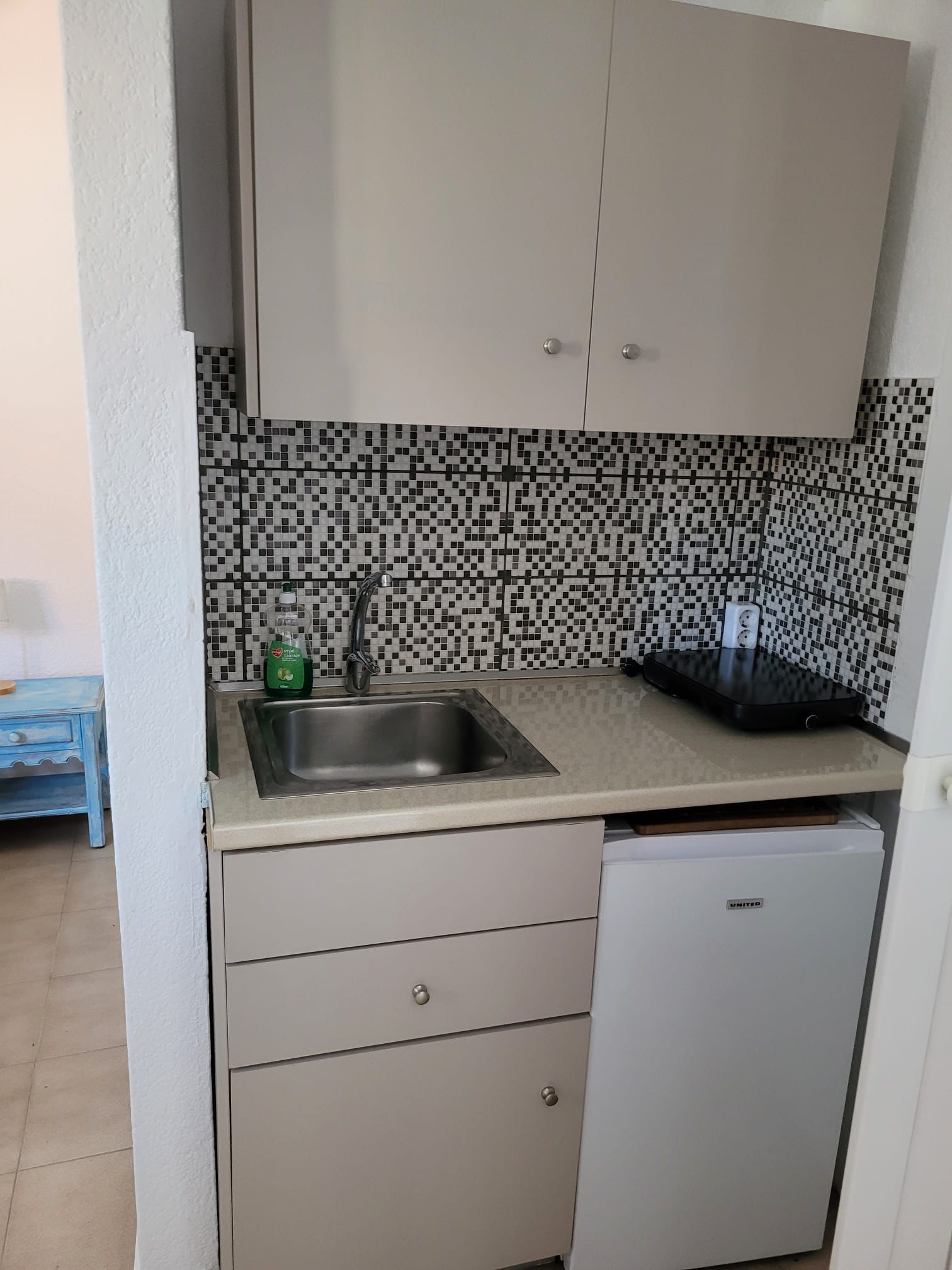 Double bedroom with blue furniture